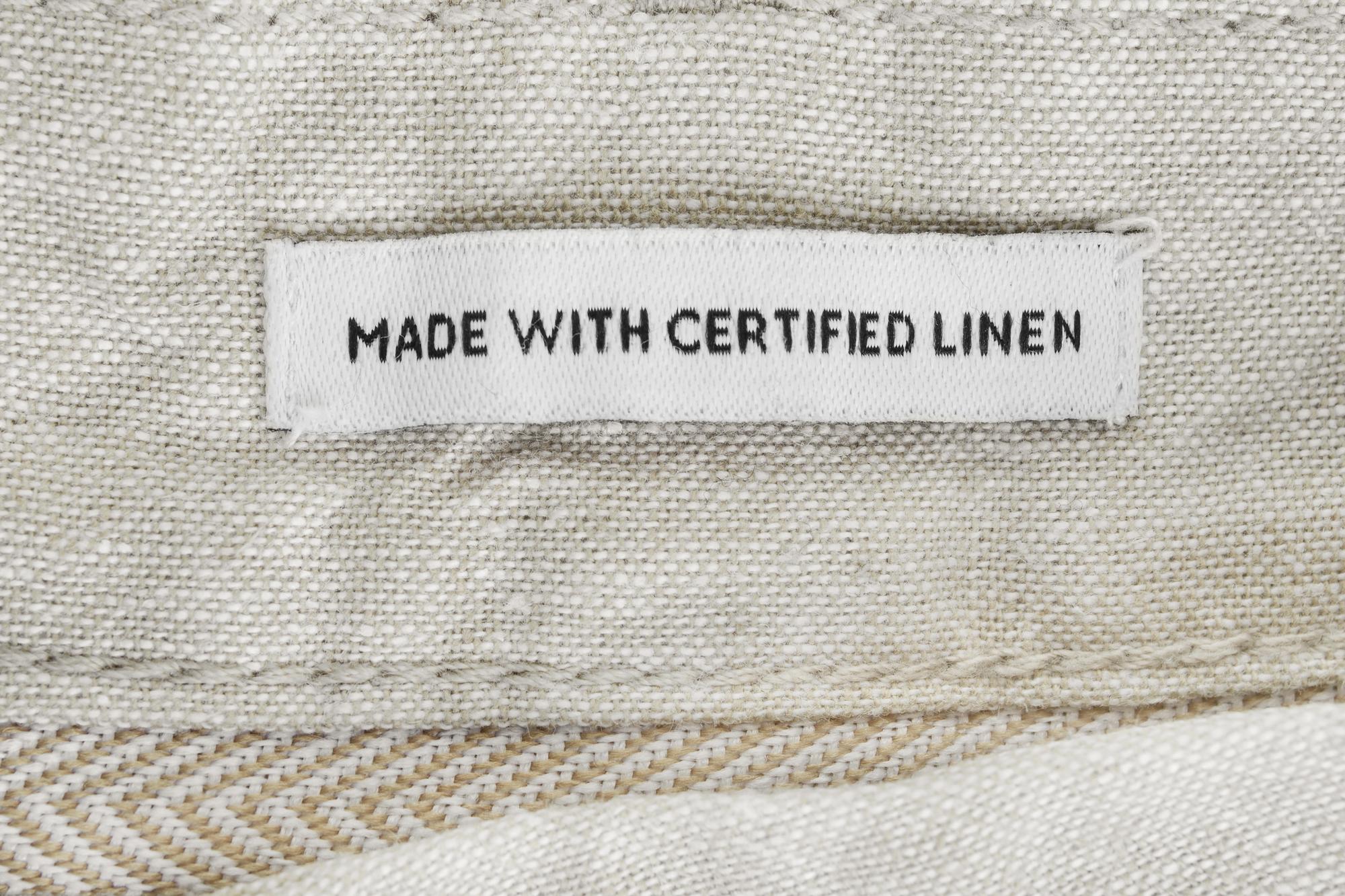 Finished embroidered label on cotton